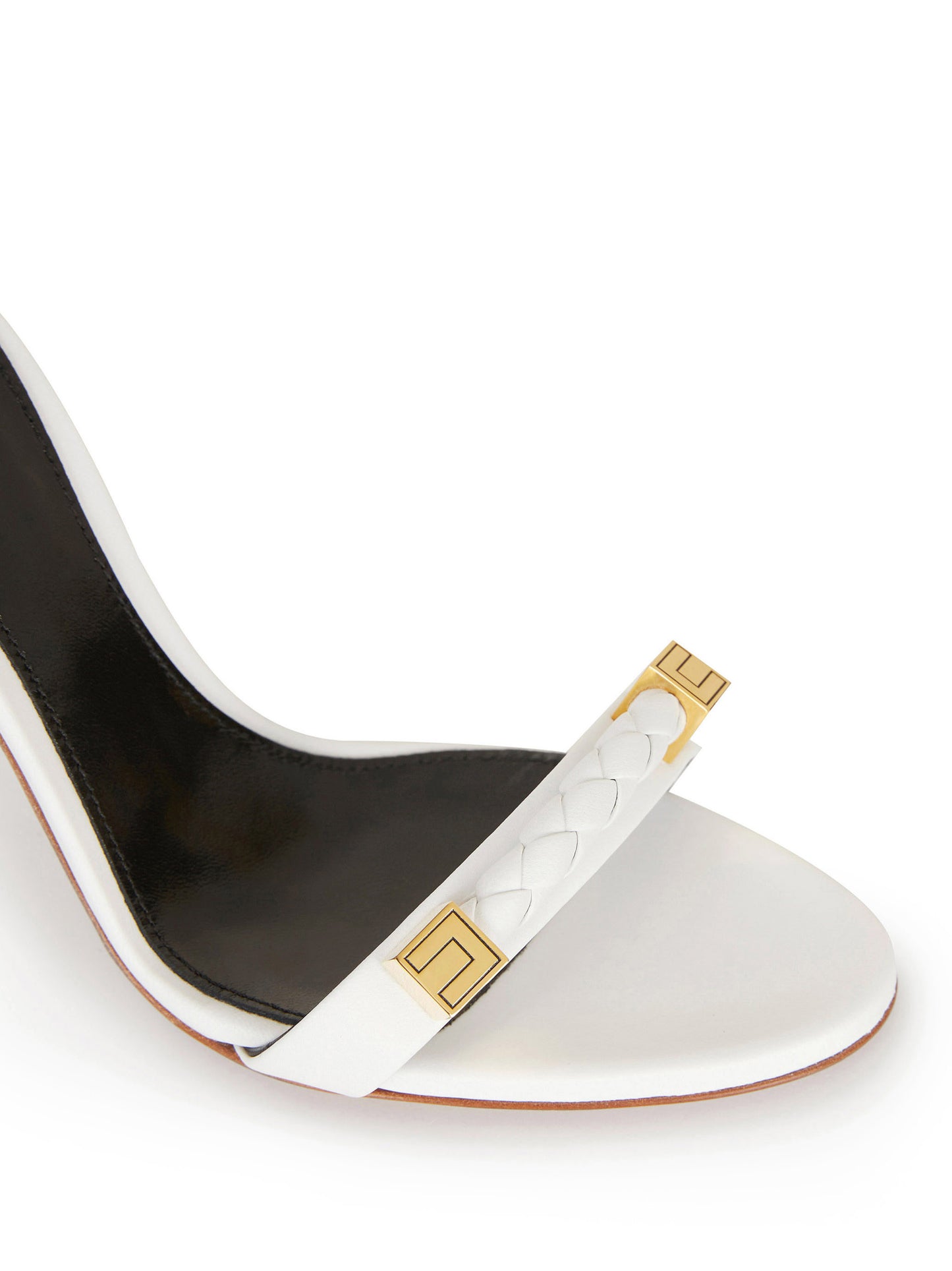 High-heeled sandals with gold accents