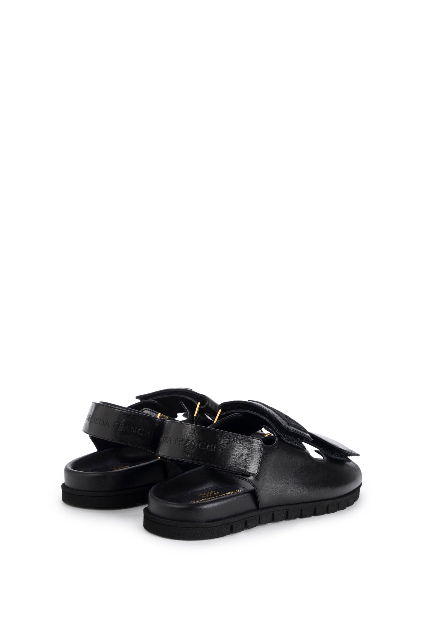 Flat leather sandals with straps