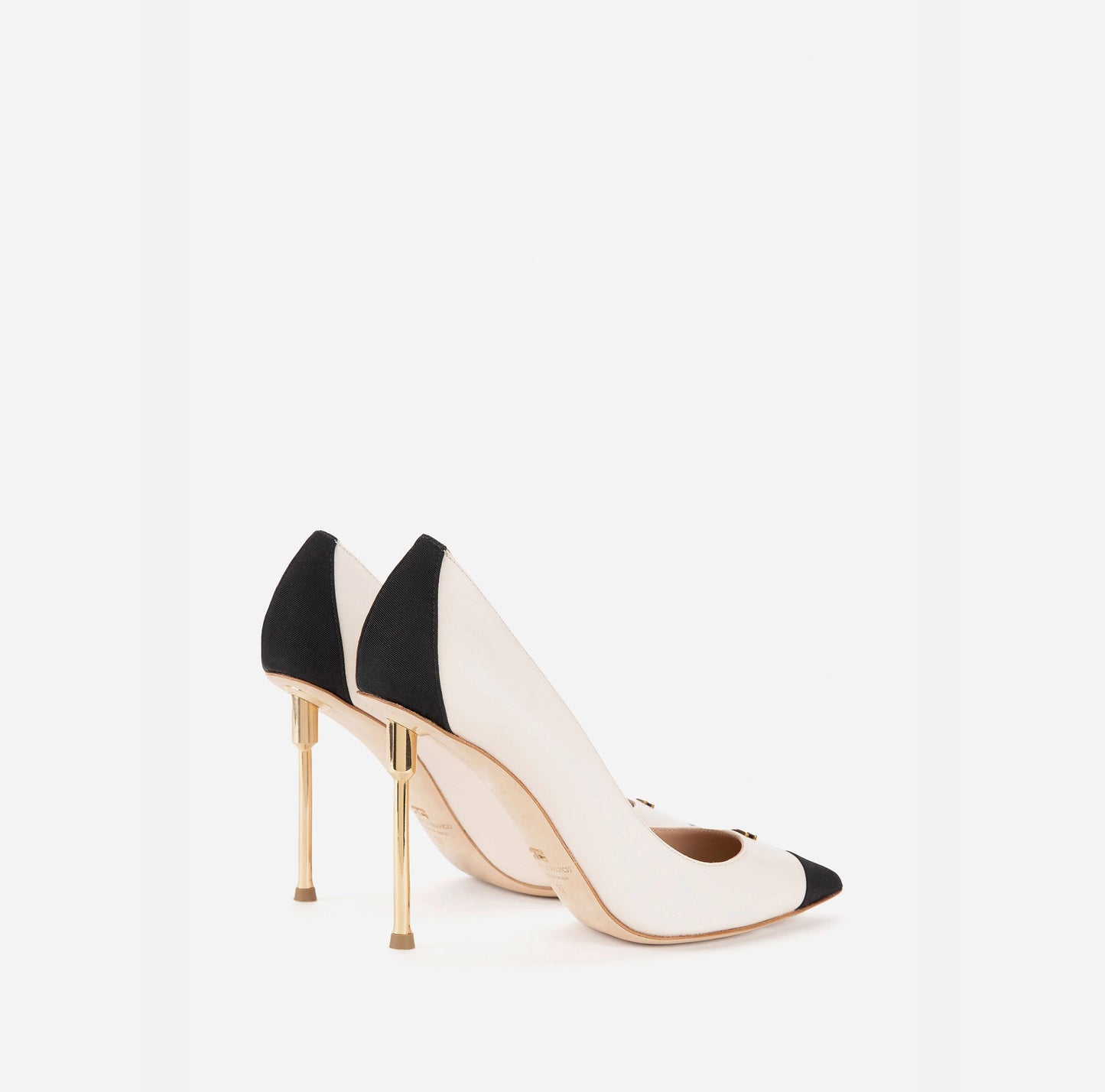 Pumps on gold plating sculptural heel