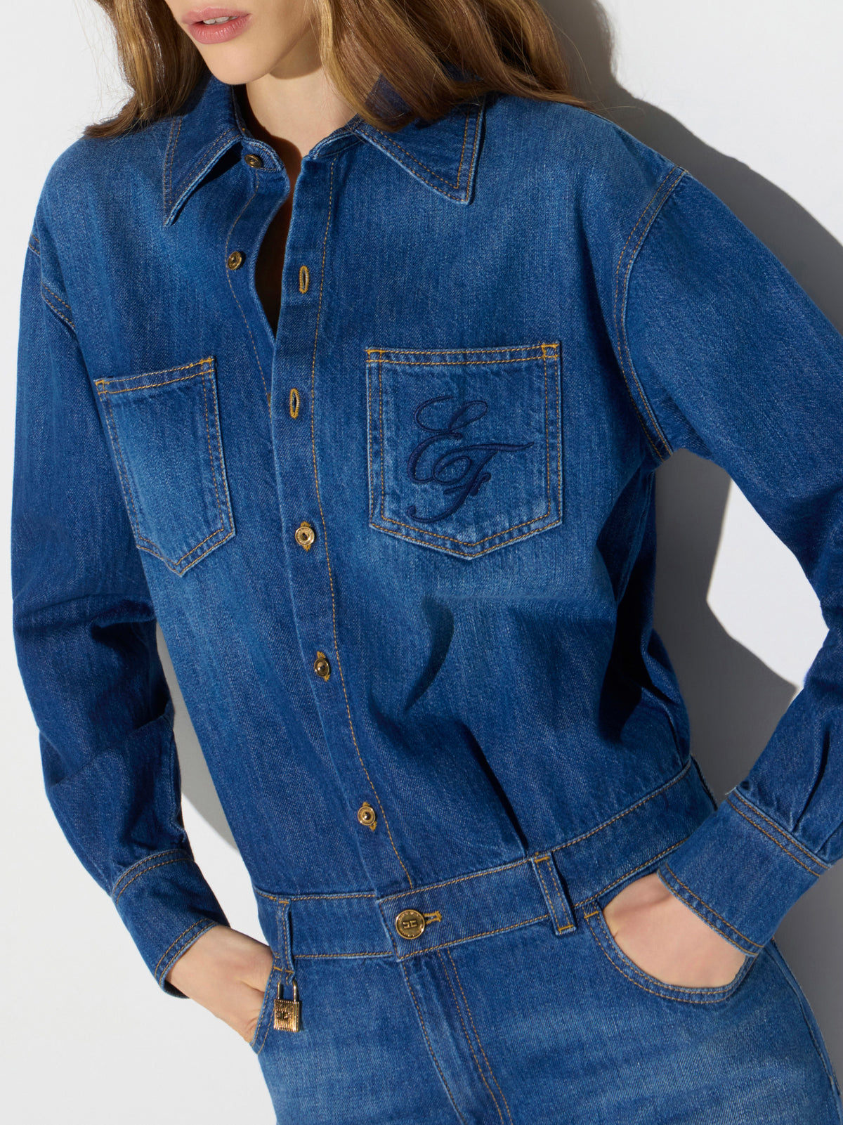 Denim jumpsuit with jewel padlock