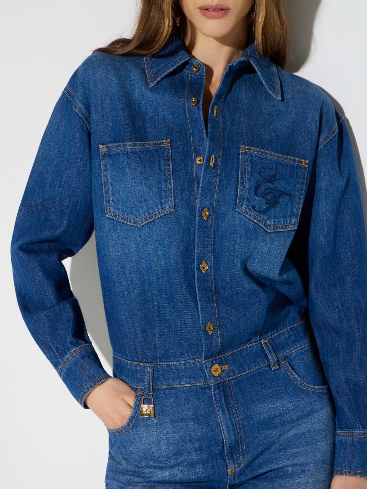 Denim jumpsuit with jewel padlock