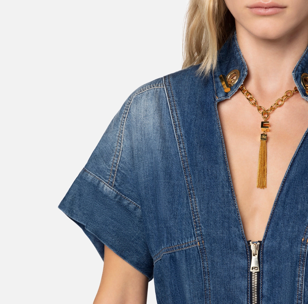 Denim jumpsuit with cufflink on the neckline