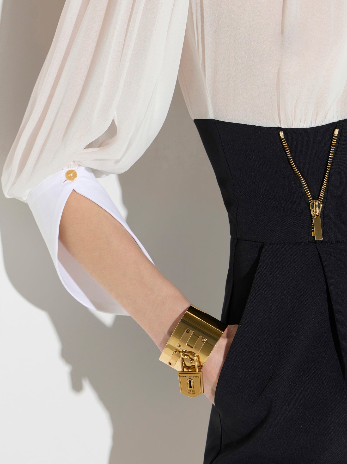 Romper suit in georgette and technical fabric