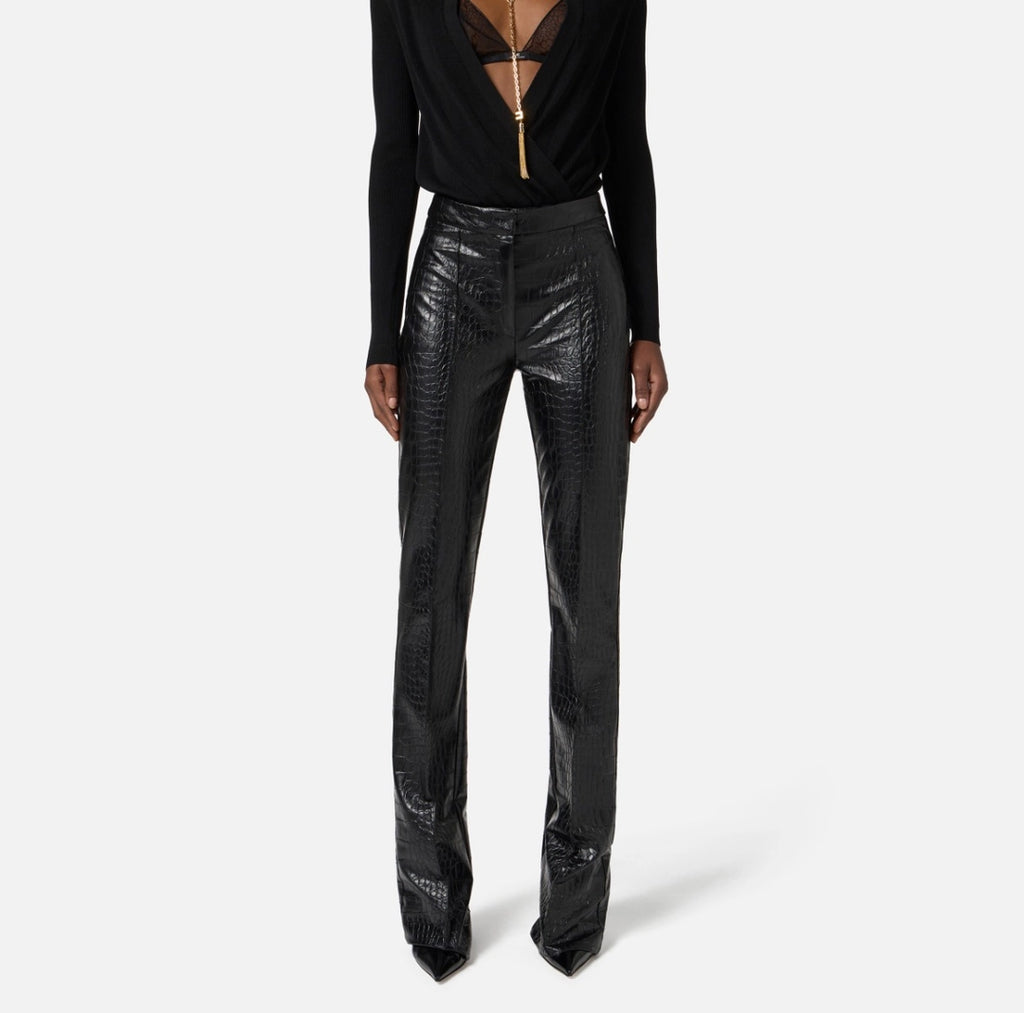 Trousers with crocodile print