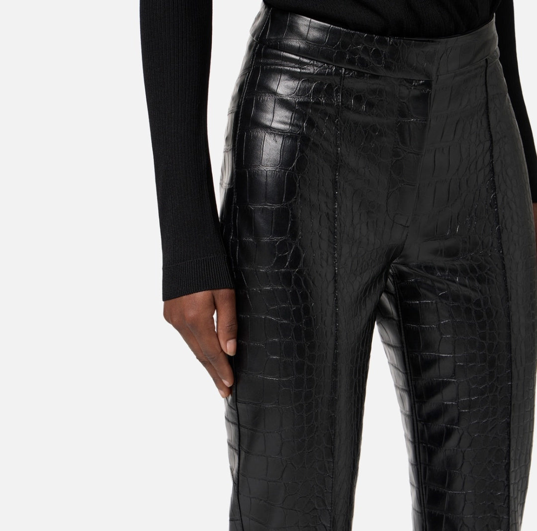 Trousers with crocodile print